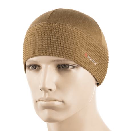 M-Tac Hjelm Watch Cap Polartec i brun farve, let og varm hue til køligt vejr, lavet af slidstærk Polartec fleece. Perfekt under hjelm.