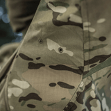 M-Tac Jakke Sturm Gen.II NYCO Extreme i Multicam. Detalje af slidstærkt stofdesign, ideel til taktisk brug og udendørs aktiviteter.