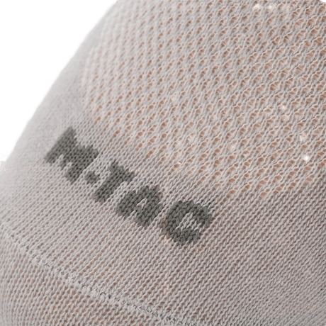 M-Tac Let Sportsokker til løb og udendørsaktiviteter, åndbare og komfortable med ergonomiske trykpunkter, i nærbillede af stoffet.