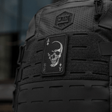 M-Tac Patch Face of War (Broderi) på rygsæk, med broderet kranium på et es af spar kort. Cordura 500D, Velcro fastgørelse. Inspireret af Vietnamkrigen.