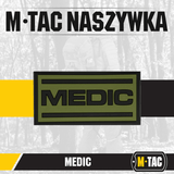 M-Tac Patch Medic PVC 3D taktik patch til medicinsk personale, fleksibelt PVC med Velcro, størrelse 70 x 35 mm, på uniform.