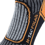 Close-up af M-Tac Sokker Polar Merino 40%, viser detaljeret strikmønster og logo på udendørs aktivitetssokker.