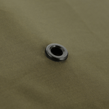 M-Tac Rygsækcover i nylon med PU-coating som beskytter mod regn og sne, vist i nærbillede af det vandtætte materiale.