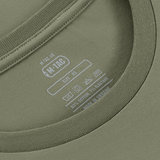 Detaljebillede af M-Tac T-Shirt Mole etikette med størrelse XS, bomuldsblanding og plejeinstruktioner.