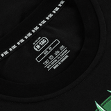 Nærbillede af etiketten på M-Tac T-Shirt Night Vision i sort, lavet af bomuldsblanding, med tydelige vaskeanvisninger og størrelse XS.