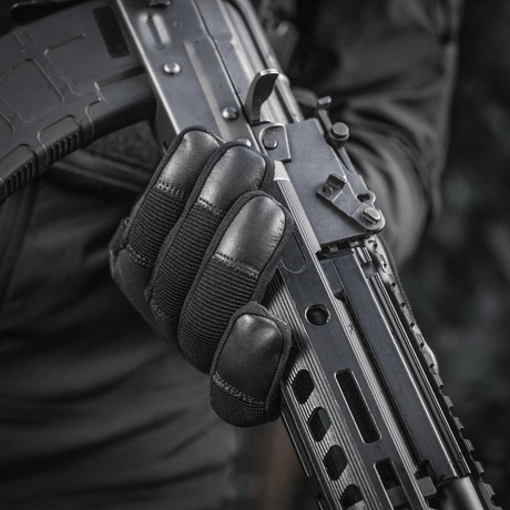 M-Tac Handsker Police Gen.2 holder et våben for sikkerhed og kontrol, lavet af læder med skridsikker inderside og justerbar Velcro.