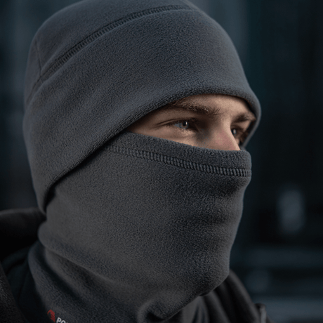 M-Tac Tube Scarf Polartec multifunktionelt halstørklæde bruges som ansigtsmaske. Varm, stilfuld beskyttelse til udendørs aktiviteter.