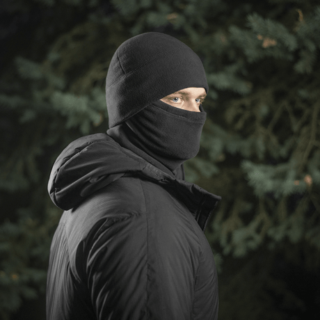 M-Tac Tube Scarf Polartec i brug, beskytter mod vind og kulde, ideel til jagt og udendørs aktiviteter, let og pladsbesparende.