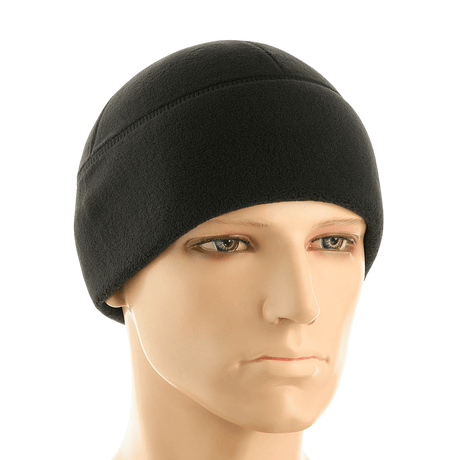 Sort M-Tac Fleece Polartec Watch Cap på mannequinhoved, ideel til kolde vejrforhold, lavet af holdbart Polartec® 200 Series fleece.