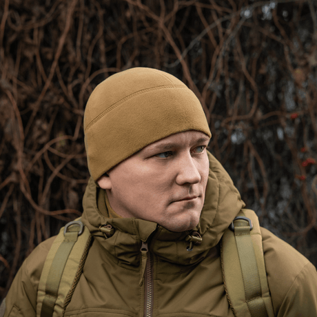 M-Tac Fleece Watch Cap Light Polartec hue i beige, perfekt til vinterbrug, med holdbar og varm Polartec Micro Series fleece.