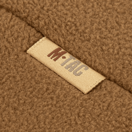 Detalje af M-Tac Watch Cap Elite Fleece Beanie Hat Slimtex i brun, med mærkelabel og slidstærkt fleece materiale, ideel til vinteraktiviteter.