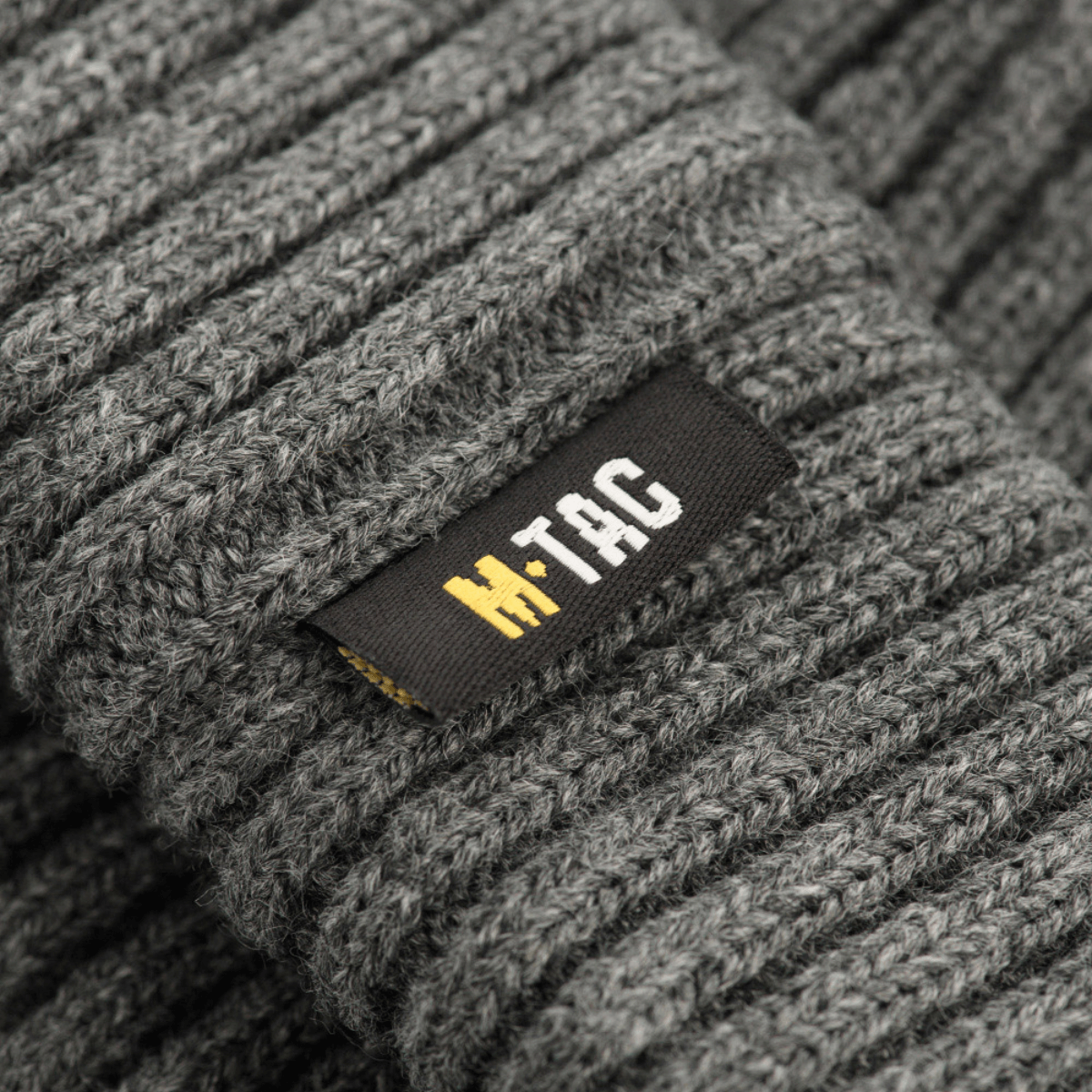 M-Tac Watch Cap 100% Akryl i grå, strikket hue til køligt vejr med lav profil og dobbelt opslag for ekstra varme, detaljebillede af tekstur.
