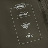 Detalje af M-Tac Paladin Jakke med Toray materiale, G-Loft isolering og YKK lynlås, der fremhæver kvaliteten af jakken.