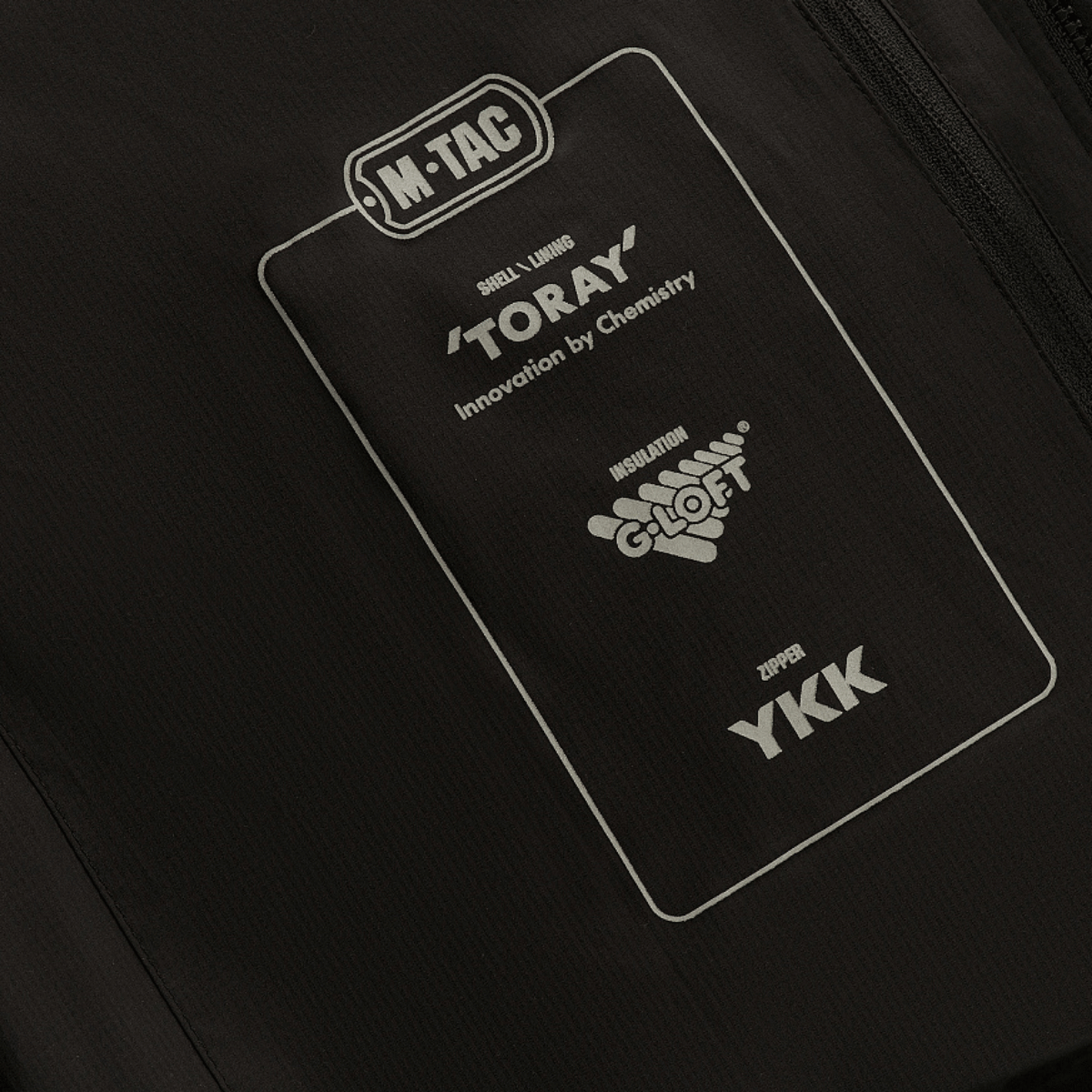 M-Tac Paladin Jakke med Toray-stofetiket, ideel til temperaturer fra 0 til -15°C, viser holdbare, vind- og vandafvisende egenskaber.