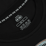 M-Tac T-Shirt Steel Knight vaskeanvisninger og producentmærke på sort t-shirt lavet af 93% bomuld og 7% elastan.