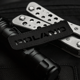 M‑Tac Patch Poland End-to-End 25x80 perforeret Cordura 500D patch med laser cut design, fastgjort til udstyr med velcro.