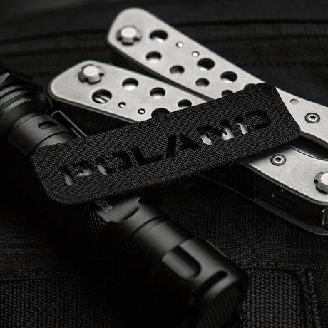M‑Tac Patch Poland End-to-End 25x80 perforeret Cordura 500D patch med laser cut design, fastgjort til udstyr med velcro.