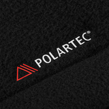 Nærbillede af M-Tac Combat Fleece Jakke Dame – Polartec og taktisk, der viser Polartec® mærkelogo på materialet.