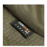 Nærbillede af M-Tac Bat Wing Taske Elite Hex med robust Cordura Hex stof i grøn farve med tekstur, fremhæver holdbarhed.