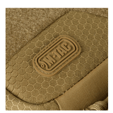Nærbillede af M-Tac Buckler Taske Elite Hex i Hex-Cordura materiale, viser M-TAC logo og tekstur.